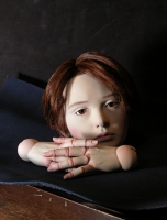 中嶋清八「少年の人形」(一部) 2014年 石粉粘  土、アクリル、ガラス眼、人毛 900mm